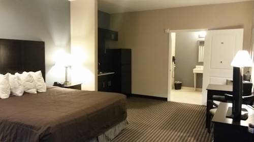 Imagen de la habitación del Hotel Atria Inn and Suites. Foto 8