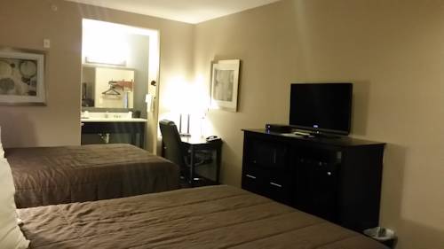 Imagen de la habitación del Hotel Atria Inn and Suites. Foto 12