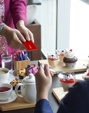 Imagen del bar/restaurante del Hotel Atria Malang. Foto 3