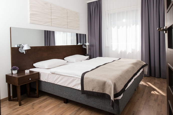 Imagen de la habitación del Hotel Atrium Apartamenty. Foto 9