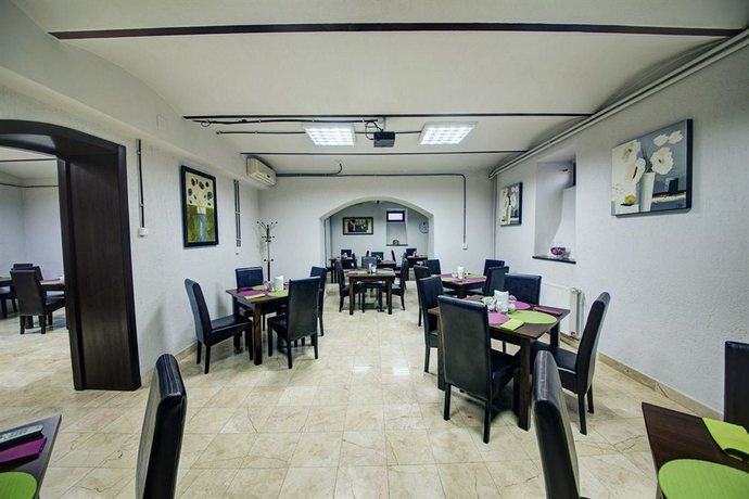 Imagen del bar/restaurante del Hotel Atrium Ateneu City Center. Foto 3