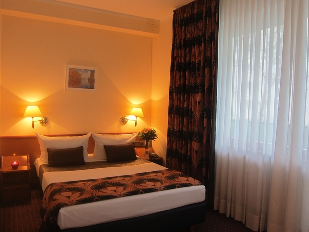 Imagen de la habitación del Hotel Atrium Berlin. Foto 7