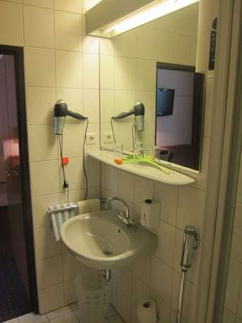Imagen de la habitación del Hotel Atrium Berlin. Foto 9