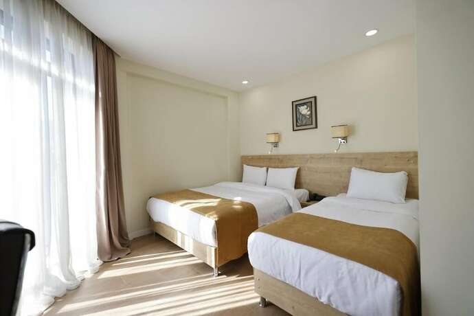 Imagen de la habitación del Hotel Atrium Boutique. Foto 15