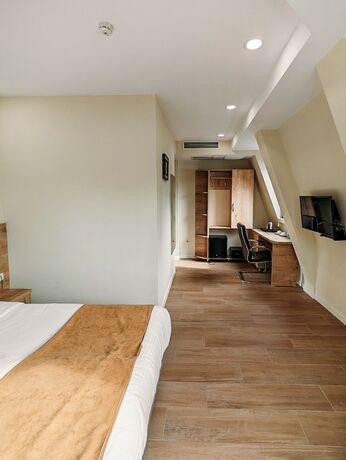 Imagen de la habitación del Hotel Atrium Boutique. Foto 16