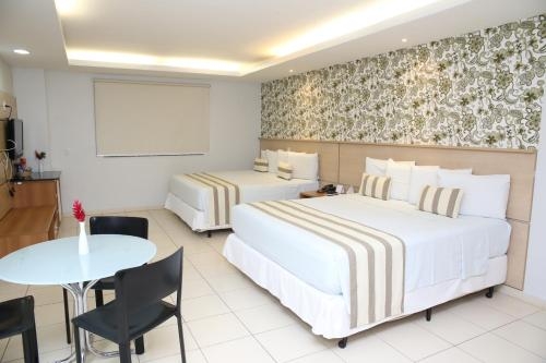 Imagen de la habitación del Hotel Atrium Confort Parauapebas. Foto 9