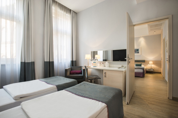 Imagen de la habitación del Hotel Atrium Fashion. Foto 9