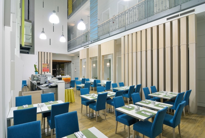 Imagen del bar/restaurante del Hotel Atrium Hotel by Mellow Mood. Foto 2