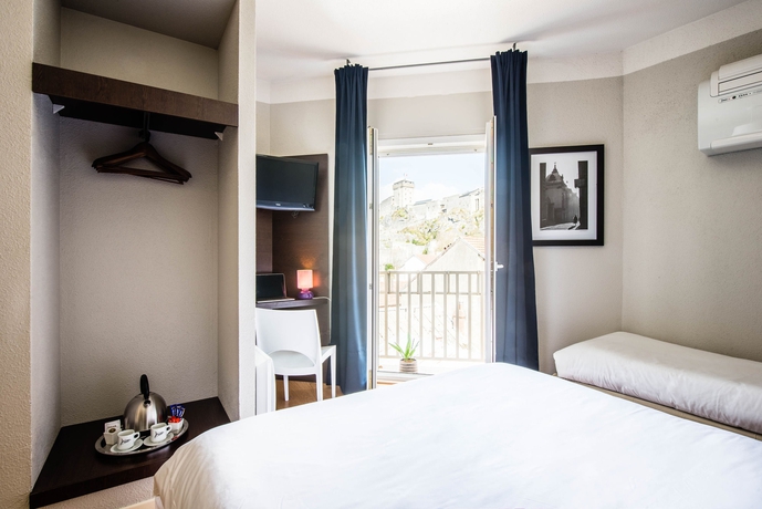 Imagen de la habitación del Hotel Atrium Mondial. Foto 7