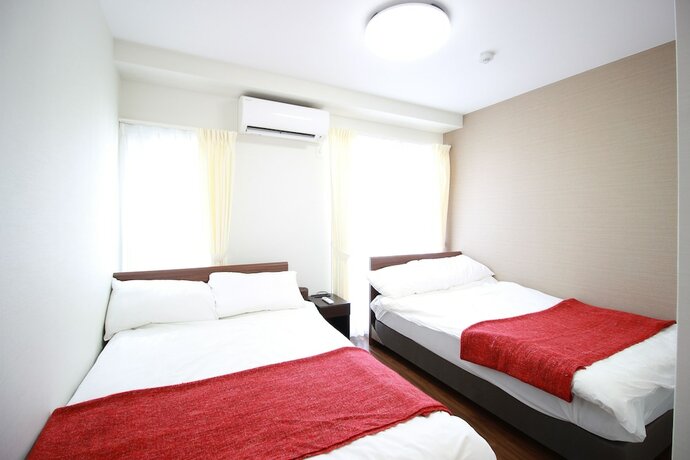 Imagen de la habitación del Hotel Atrium, Osaka. Foto 9