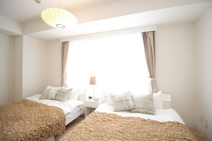 Imagen de la habitación del Hotel Atrium, Osaka. Foto 21