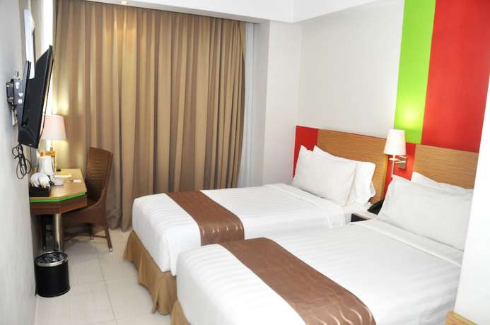 Imagen de la habitación del Hotel Atrium Premiere. Foto 16