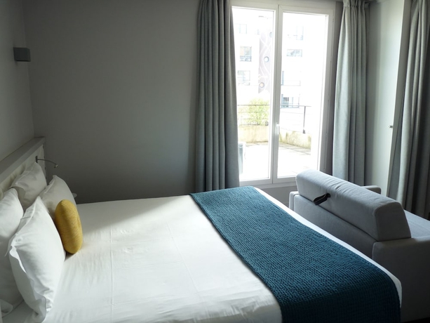 Imagen de la habitación del Hotel Atrium, Suresnes. Foto 6