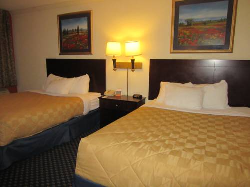 Imagen de la habitación del Hotel Atrium & Conference Center. Foto 7