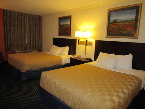 Imagen de la habitación del Hotel Atrium & Conference Center. Foto 11