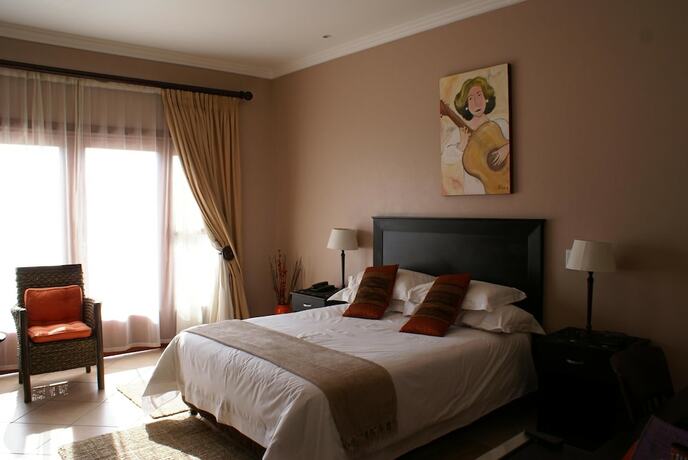 Imagen de la habitación del Hotel Attache Guest Lodge. Foto 18
