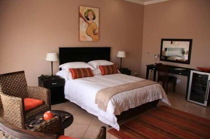 Imagen de la habitación del Hotel Attache Guest Lodge. Foto 19