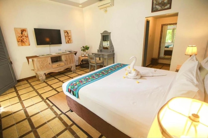 Imagen de la habitación del Hotel Attara Heritage Senggigi. Foto 11