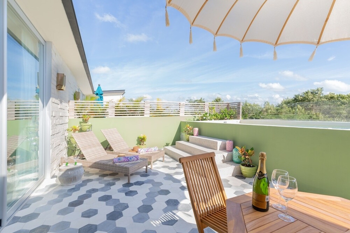 Imagen de la habitación del Hotel Attha Cenote Luxury Condo. Foto 4