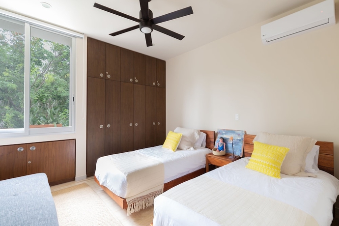 Imagen de la habitación del Hotel Attha Cenote Luxury Condo. Foto 9