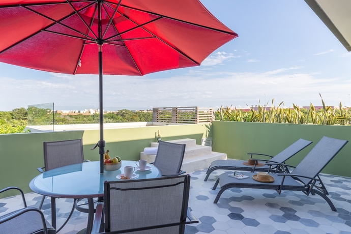 Imagen de la habitación del Hotel Attha Cenote Luxury Condo. Foto 10