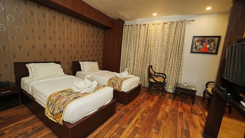 Imagen de la habitación del Hotel Atulyaa Taj. Foto 5