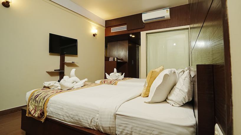 Imagen de la habitación del Hotel Atulyaa Taj. Foto 11