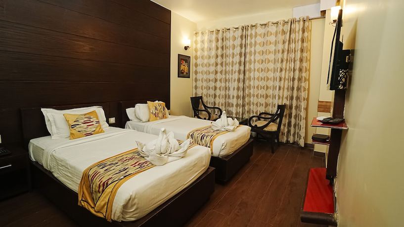 Imagen de la habitación del Hotel Atulyaa Taj. Foto 18