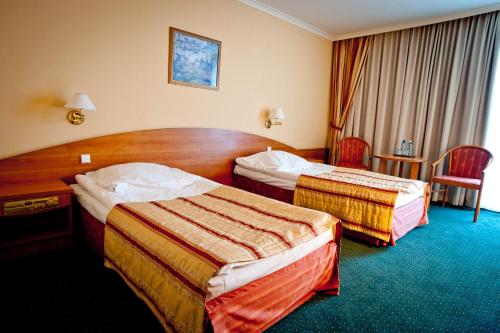 Imagen de la habitación del Hotel Atut w Licheniu. Foto 10