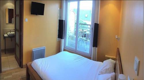 Imagen de la habitación del Hotel Au Bout Du Monde. Foto 2