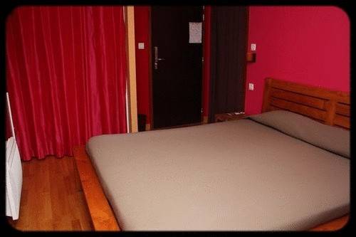 Imagen de la habitación del Hotel Au Bout Du Monde. Foto 4