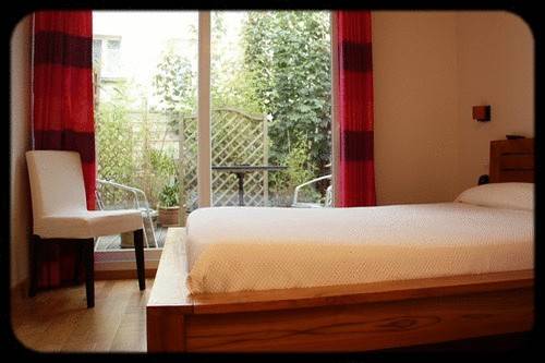 Imagen de la habitación del Hotel Au Bout Du Monde. Foto 7