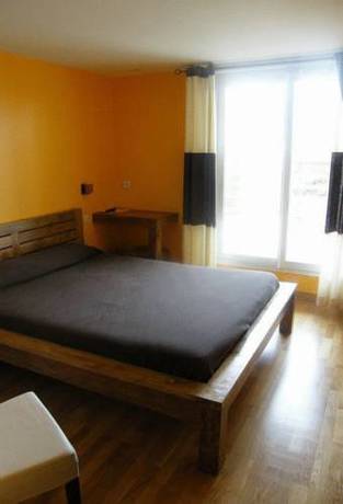 Imagen de la habitación del Hotel Au Bout Du Monde. Foto 8