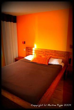 Imagen de la habitación del Hotel Au Bout Du Monde. Foto 9