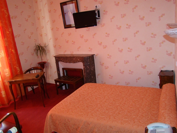 Imagen de la habitación del Hotel Au Chapon Fin. Foto 6