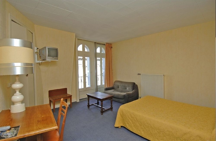 Imagen de la habitación del Hotel Au Chapon Fin. Foto 7