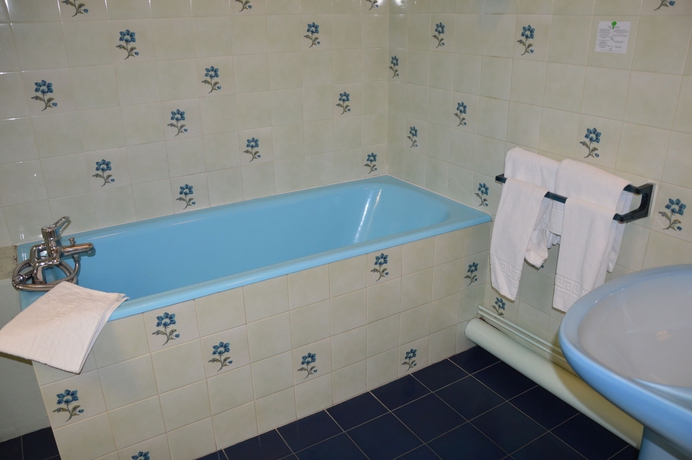 Imagen de la habitación del Hotel Au Chapon Fin. Foto 8