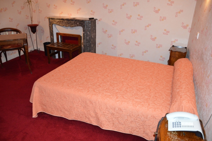 Imagen de la habitación del Hotel Au Chapon Fin. Foto 9