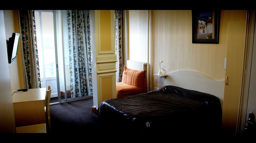 Imagen de la habitación del Hotel Au Chapon Fin. Foto 12