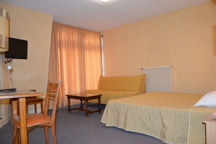 Imagen de la habitación del Hotel Au Chapon Fin. Foto 13