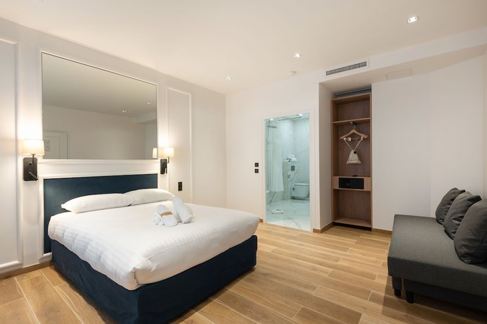 Imagen de la habitación del Hotel Au Coeur De Republique. Foto 2