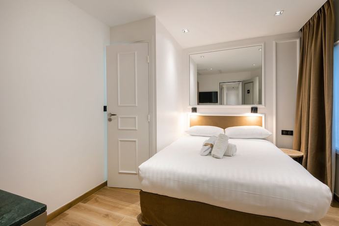 Imagen de la habitación del Hotel Au Coeur De Republique. Foto 3