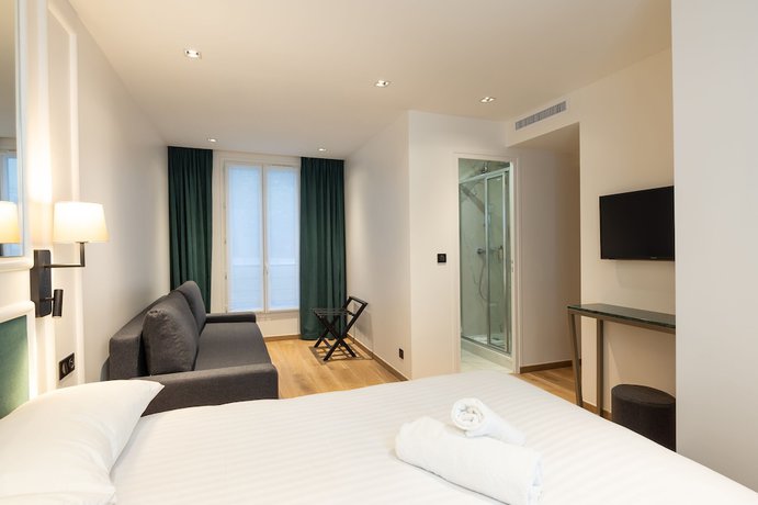 Imagen de la habitación del Hotel Au Coeur De Republique. Foto 6