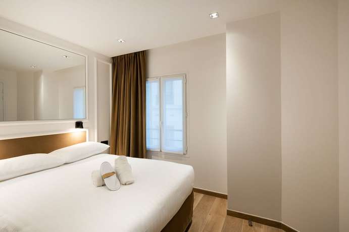 Imagen de la habitación del Hotel Au Coeur De Republique. Foto 15