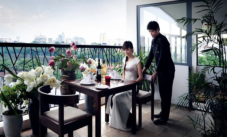 Imagen del bar/restaurante del Hotel Au Coeur D'hanoi Boutique. Foto 5