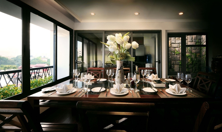 Imagen del bar/restaurante del Hotel Au Coeur D'hanoi Boutique. Foto 8