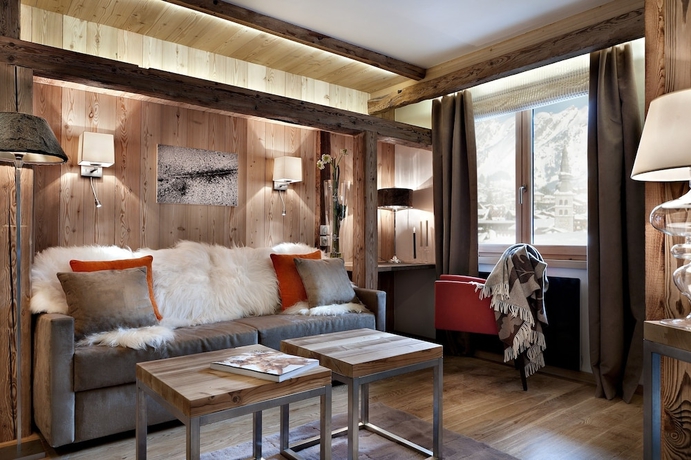 Imagen de la habitación del Hotel Au Coeur Du Village. Foto 9