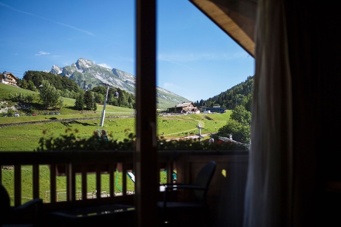 Imagen de la habitación del Hotel Au Coeur Du Village. Foto 11