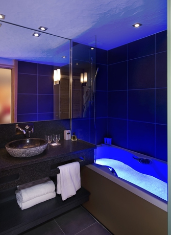 Imagen de la habitación del Hotel Au Coeur Du Village. Foto 12