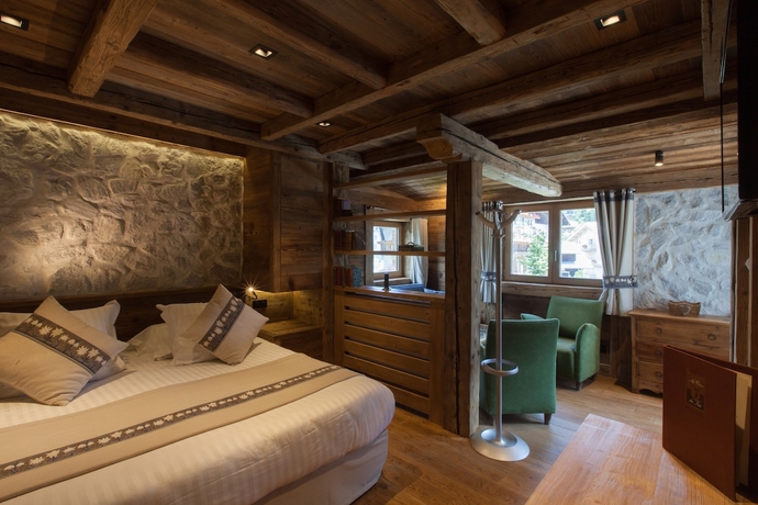 Imagen de la habitación del Hotel Au Coin Du Feu. Foto 2